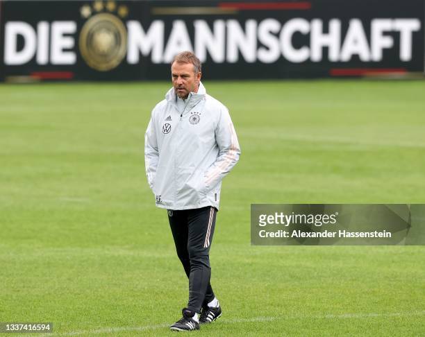 Hans-Dieter Flick, Head Coach of Germany looks on during a training session at Gazi-Stadion auf der Waldau on August 31, 2021 in Stuttgart, Germany.