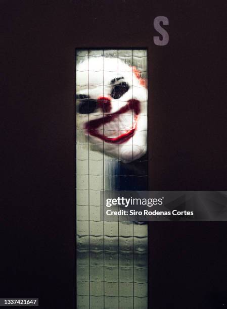 halloween; trick or treating in the elevator - killer clown stock pictures, royalty-free photos & images