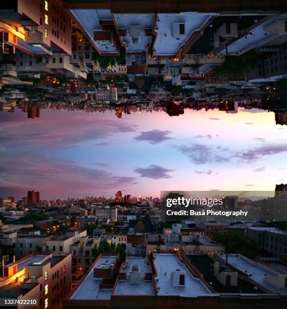 capsized reflected image of horizon at twilight over rooftops in harlem, new york city - new york state landscape stock pictures, royalty-free photos & images