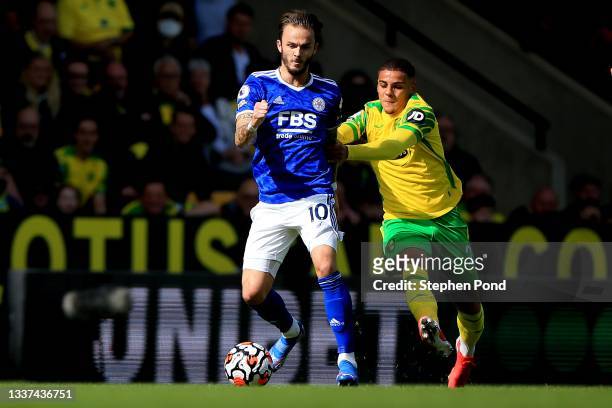 Max Aarons of Norwich City and James Maddison of Leicester City during the Premier League match between Norwich City and Leicester City at Carrow...