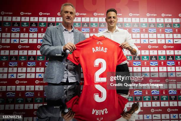 Player Santiago Arias and Granada CF Sports Director Pep Boada pose for the media during Santiago Arias presentation as a new player of Granada CF at...