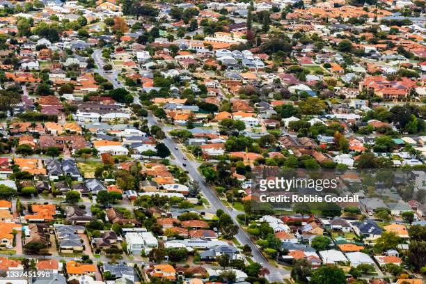aerial view of colourful houses in suburban streets around perth, western australia - perth australien stock-fotos und bilder