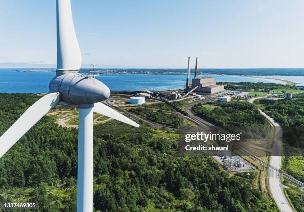 wind power versus coal power - wind power station stock pictures, royalty-free photos & images