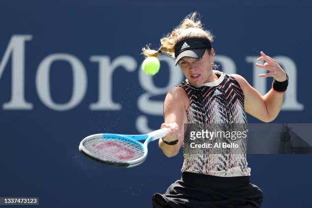 Catherine McNally of the United States returns the ball against Karolina Pliskova of Czech Republic during her Women's Singles first round match on...