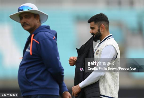 Virat Kohli and Ravi Shastri of India during a training session before Thursday's 4th LV= Test Match between England and India at The Kia Oval on...