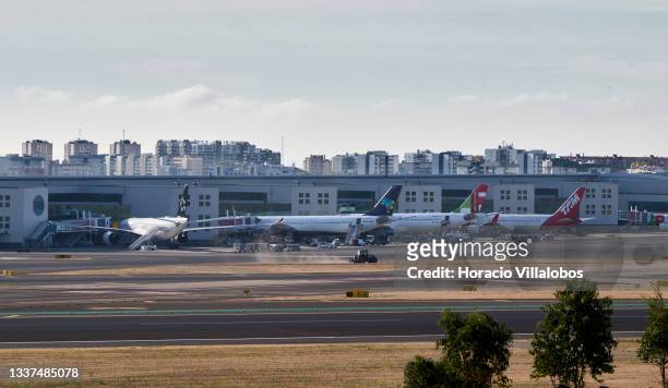 Azul Airlines, TAP Air Portugal and TAM aircraft sit in the tarmac in Lisbon Humberto Delgado International Airport on the last day of August,...