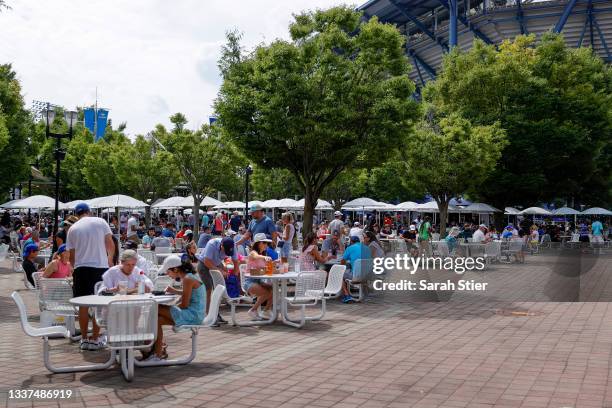 Fans eat in the food court during Day Two of the 2021 US Open at the Billie Jean King National Tennis Center on August 31, 2021 in the Flushing...