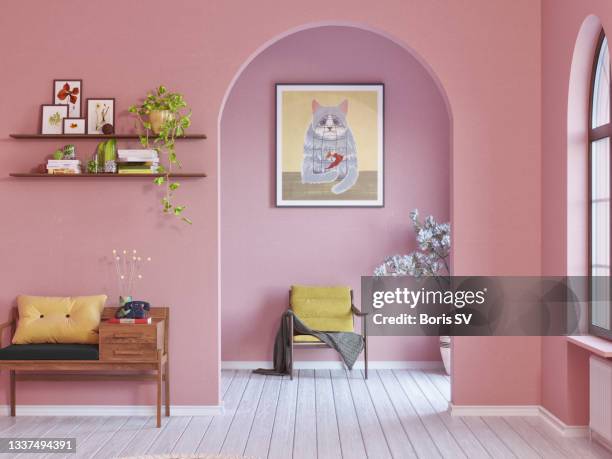 spanish villa with portrait of cat - pink colour stock-fotos und bilder