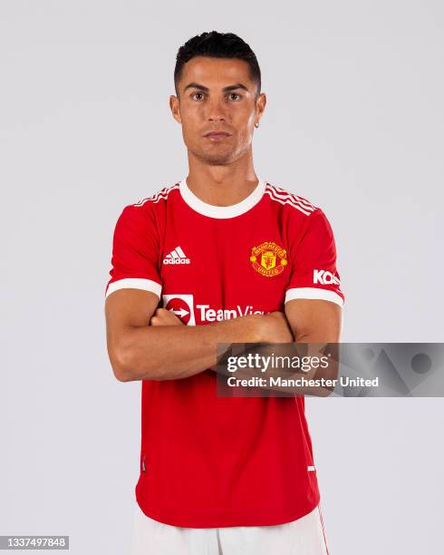 Cristiano Ronaldo of Manchester United poses after signing for the club on August 31, 2021 in Lisbon, Portugal.