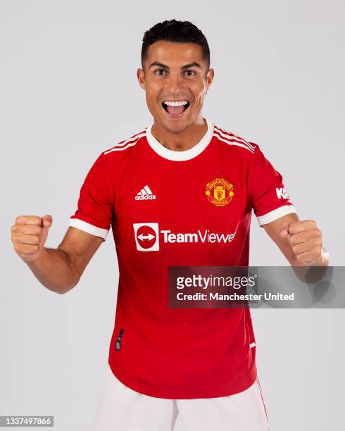 Cristiano Ronaldo of Manchester United poses after signing for the club on August 31, 2021 in Lisbon, Portugal.