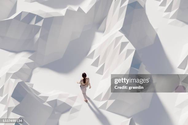 woman walking in vr landscape - abstract mountain range stock pictures, royalty-free photos & images