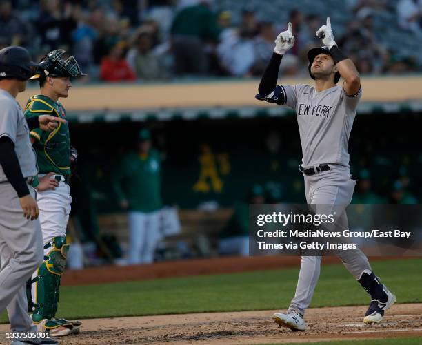 New York Yankees' Joey Gallo celebrates after hitting a three-run home run off Oakland Athletics starting pitcher James Kaprielian in the third...