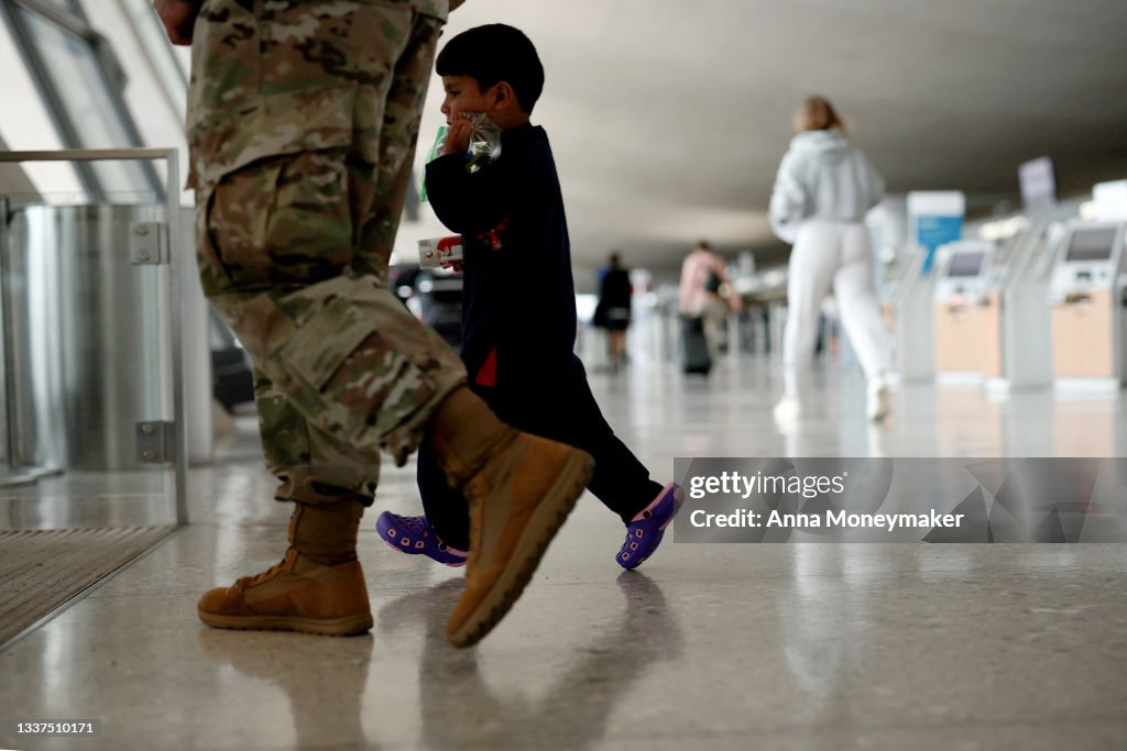 Afghan Refugees Arrive At Dulles Airport After US Pulls Out Final Troops