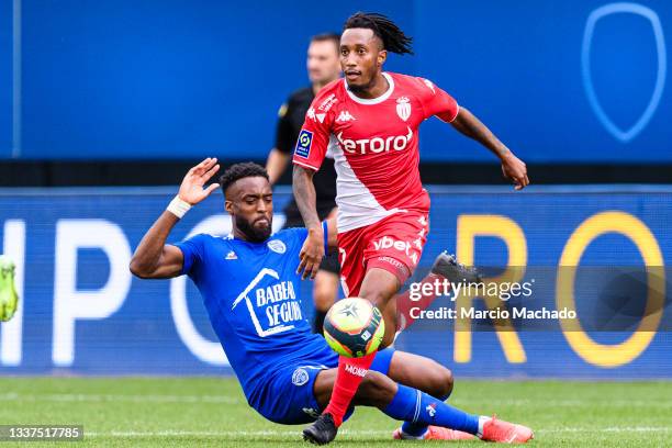 Yoann Salmier of Troyes battles for the ball with Gelson Martins of AS Monaco during the Ligue 1 Uber Eats match between Troyes and Monaco at Stade...