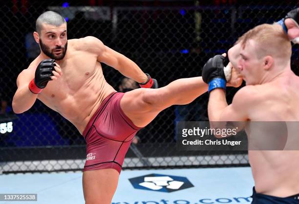 Leonardo Damiani of Italy kicks AJ Fletcher in their welterweight fight during Dana White's Contender Series season five week one at UFC APEX on...