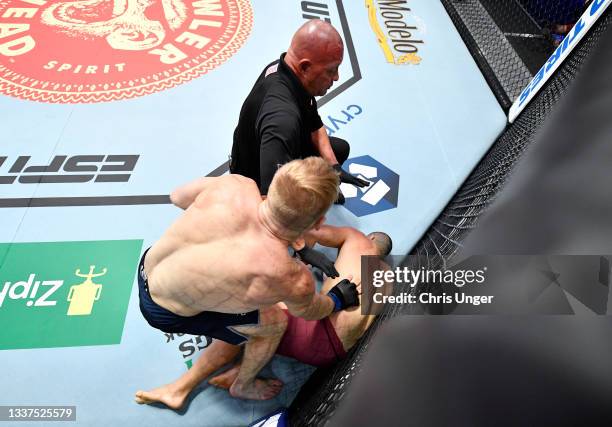 Fletcher reacts after his knockout victory over Leonardo Damiani of Italy in their welterweight fight during Dana White's Contender Series season...