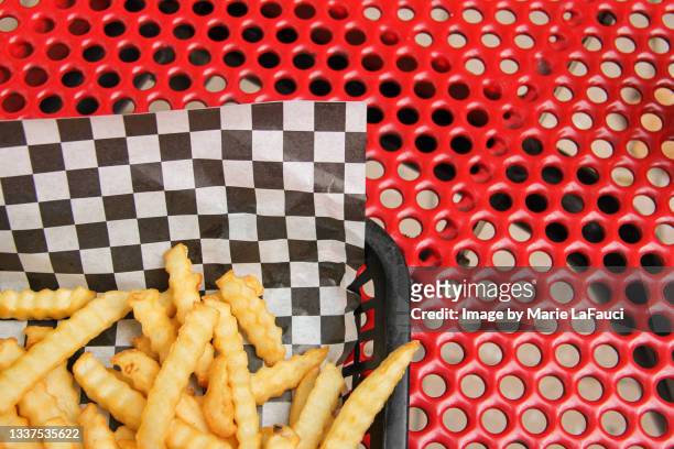 french fries on tray outdoors - scalloped stock pictures, royalty-free photos & images