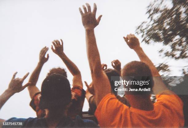 rollercoaster people, roller coaster riders full of excitement and adrenaline - human arm photos stock pictures, royalty-free photos & images