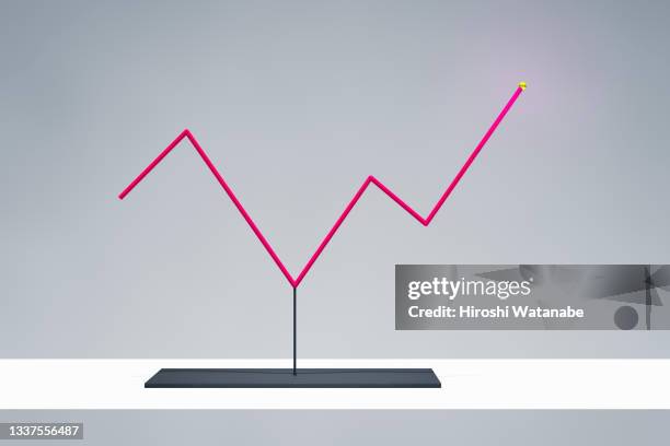 line graph object on display that repeats rising and fallin - line graph foto e immagini stock