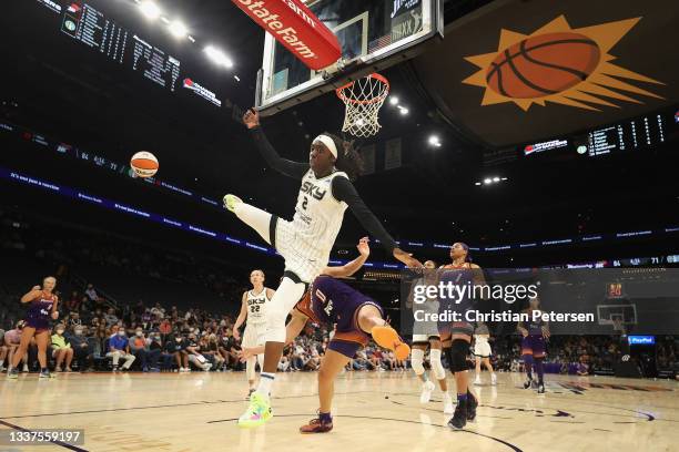 Kahleah Copper of the Chicago Sky loses the ball after driving past Kia Nurse of the Phoenix Mercury during the second half of the WNBA game at the...