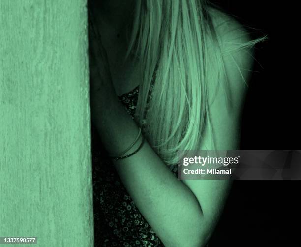 woman hiding - violence foto e immagini stock