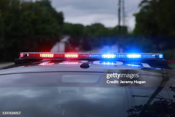 police car lights - police lights stock pictures, royalty-free photos & images