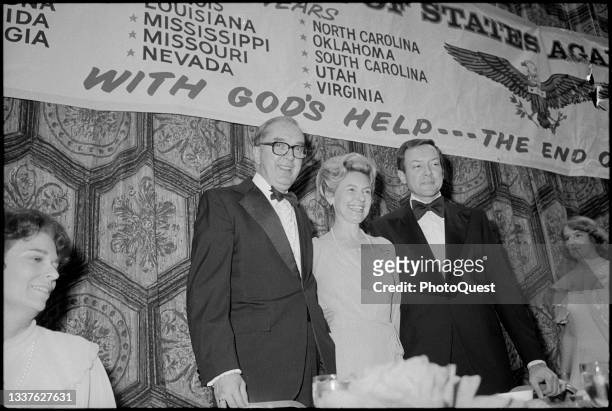 View of, from center left, US Senator Jesse Helms , American conservative activist Phyllis Schlafly , and Senator Orrin Hatch during an 'End of the...