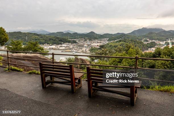 empty benches on top of the mountain - japao stock pictures, royalty-free photos & images