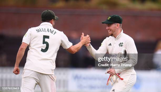 Steven Mullaney and Tom Moores of Nottinghamshire celebrate following Day Three of the LV= County Championship match between Somerset and...