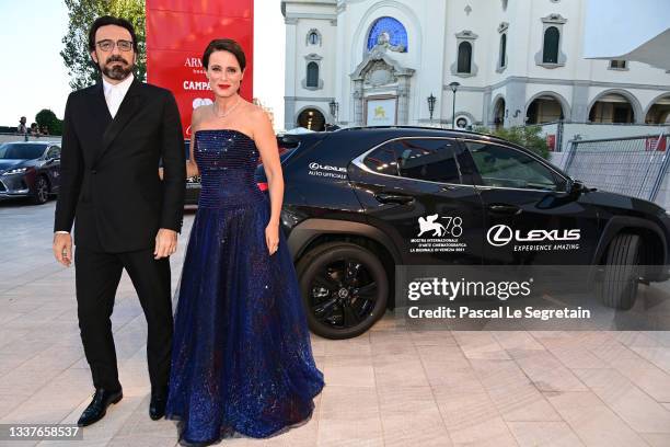 Israel Elejalde and Aitana Sánchez-Gijón arrive on the red carpet ahead of the "Madres Paralelas" screening during the 78th Venice Film Festival on...