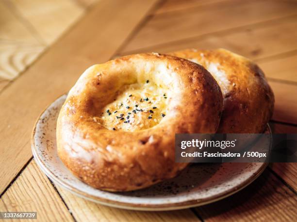 close-up of bread in plate on table - tandoor oven stock pictures, royalty-free photos & images