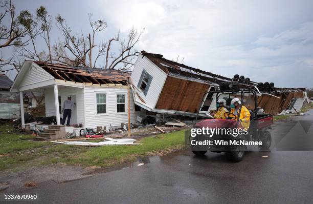 Search and rescue team from Texas works outside a home destroyed by Hurricane Ida September 1, 2021 in Golden Meadow, Louisiana. Ida made landfall...