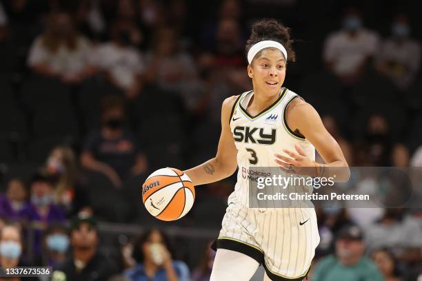 Candace Parker of the Chicago Sky handles the ball against the Phoenix Mercury during the first half of the WNBA game at the Footprint Center on...