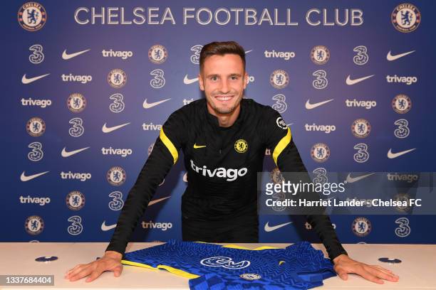 Saul Niguez poses for a photograph as he signs for Chelsea FC at Chelsea Training Ground on September 01, 2021 in Cobham, England.