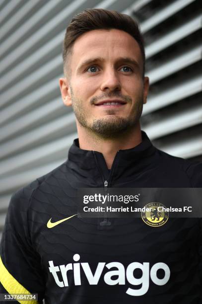 Saul Niguez poses for a photograph as he signs for Chelsea FC at Chelsea Training Ground on September 01, 2021 in Cobham, England.