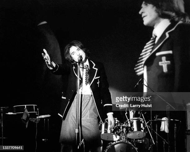 Ray Davies and Dave Davies and the Kinks are performing in Sacramento State College in Sacramento, California on February 1 1976 .