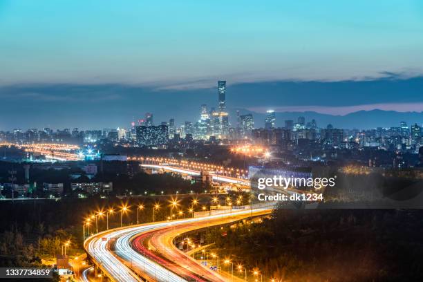 expressway and beijing central business district - solar street light stock pictures, royalty-free photos & images