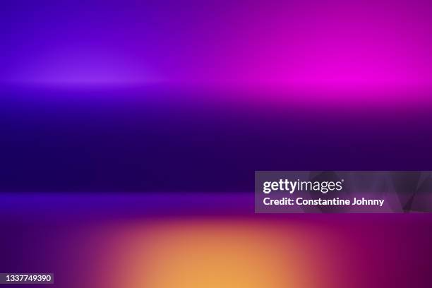 abstract shades of blue, pink and purple with illuminating yellow and orange background. - dancefloor fotografías e imágenes de stock