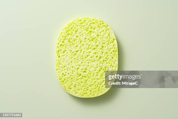 green cleaning sponge - pore stock pictures, royalty-free photos & images