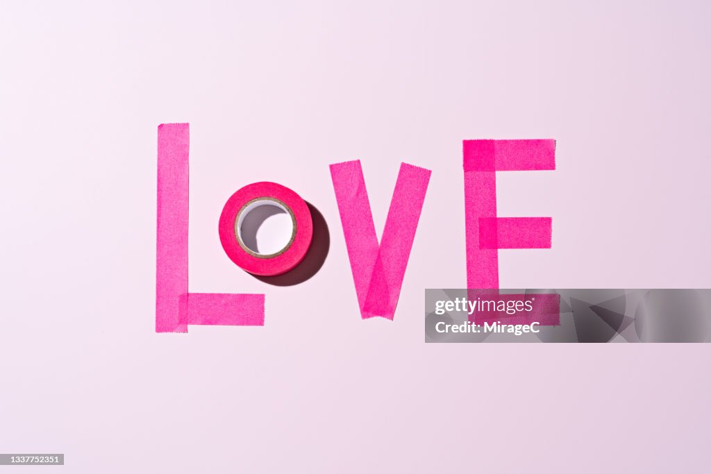 LOVE Word Made of Pink Adhesive Tape