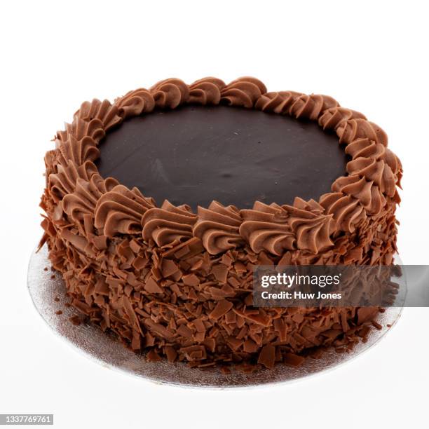 iced birthday cake, blank without a message, isolated on a white background - torta alla crema foto e immagini stock