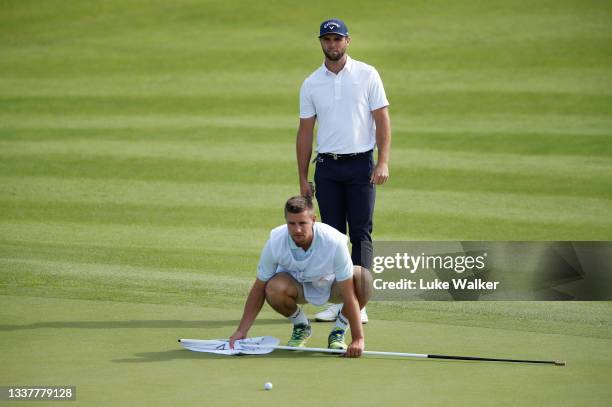 Adri Arnaus of Spain lines up a putt on the 18th green during Day One of The Italian Open at Marco Simone Golf Club on September 02, 2021 in Rome,...