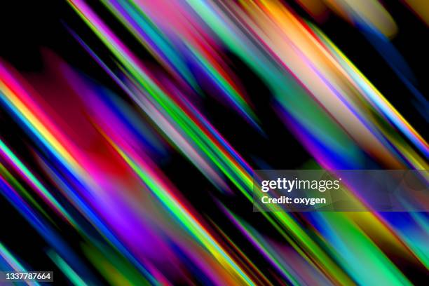 abstract speed motion blur striped glitch distorted tilt colorful black background - light blur stock-fotos und bilder