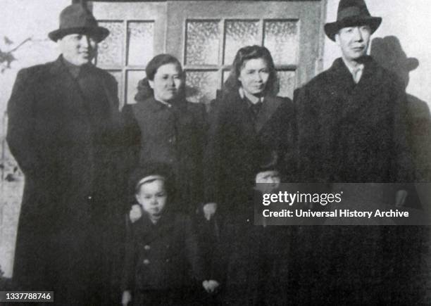 Kim Il Sung with his wife, son, Kim Jong Il, the Chinese partisan commander Zhou Baozhong , his wife and daughter in the USSR. 1940s.