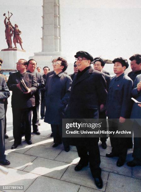 Kim Il-sung founder of North Korea and Kim Jong Il, inspect the Juche Idea Monument erected on the picturesque bank of the Taedong River.