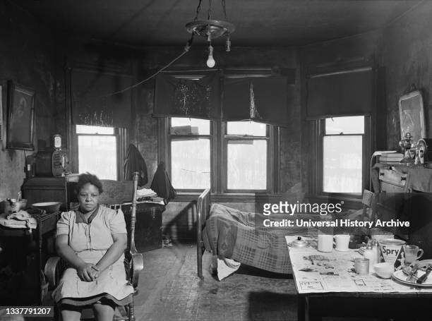 Woman living with her Family in Dilapidated House in Mount Washington District of Beaver Falls, Pennsylvania, USA, Jack Delano, U.S. Farm Security...