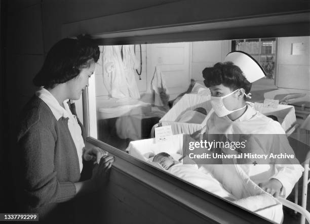 Nurse Aiko Hamaguchi, mother Frances Yokoyama, baby Fukomoto, Manzanar Relocation Center, California, USA, Ansel Adams, Manzanar War Relocation...