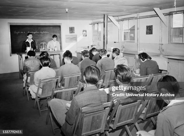 Japanese-American Students sitting in Classroom Laboratory during Science Lecture, Manzanar Relocation Center, California, USA, Ansel Adams, Manzanar...