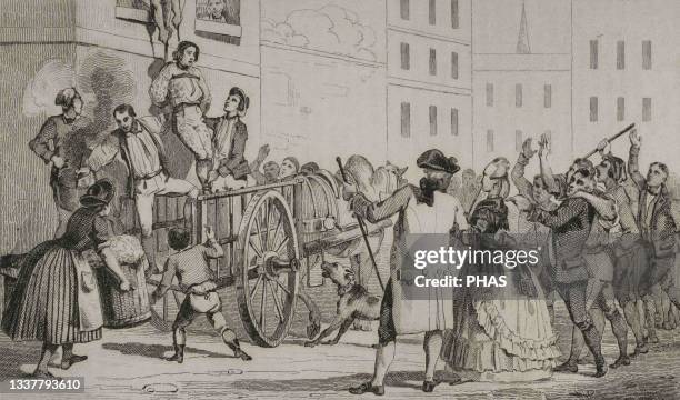 History of the United States of America, 18th century. British colonies in North America. Loyalist captured and humiliated, being feathered by a...