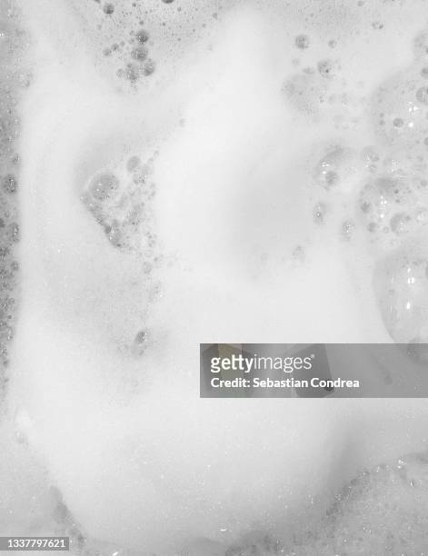 soap foam in the tub
background - bath bubble stockfoto's en -beelden